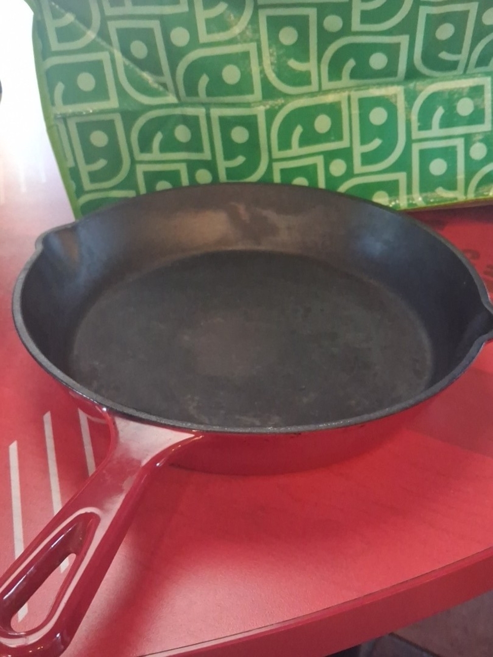 Sur La Table Red Enamel Cast Iron Skillet with Black Interior